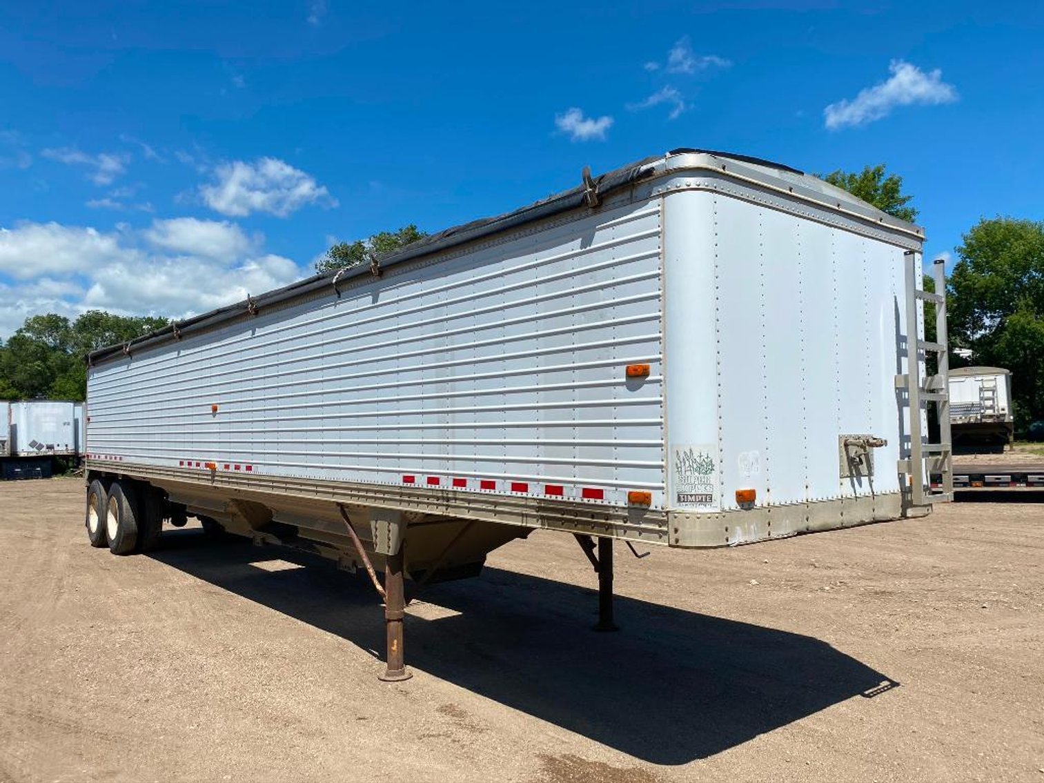 (7) Semis, (8) Grain Trailers, 1981 Versatile 950, 2007 International Bucket Truck