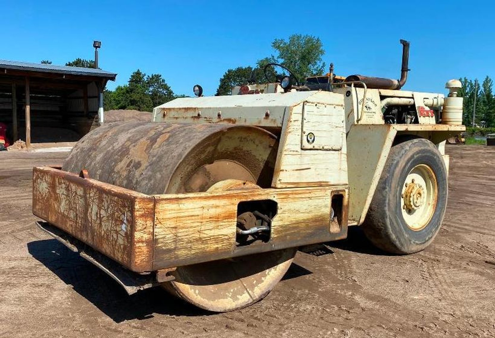 Excavating Surplus Equipment: 52' Step Deck, Trucks, Loader, End Dump, Roller