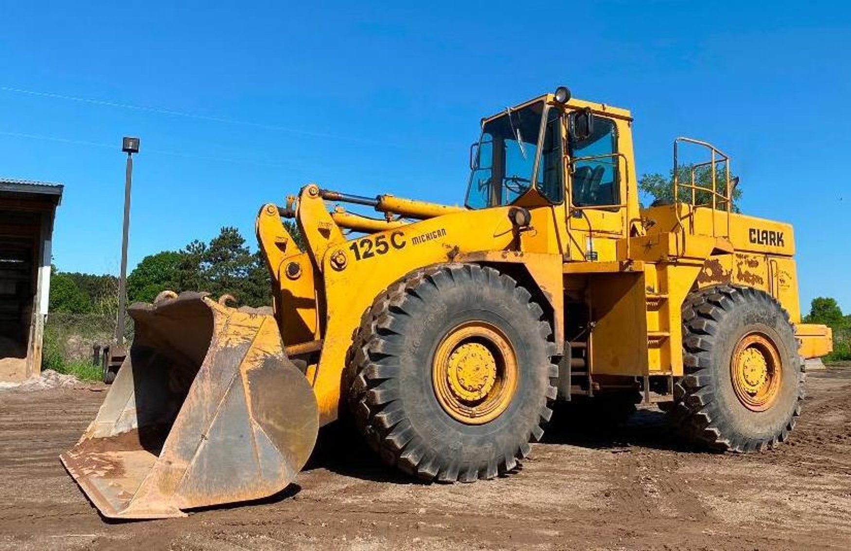 Excavating Surplus Equipment: 52' Step Deck, Trucks, Loader, End Dump, Roller