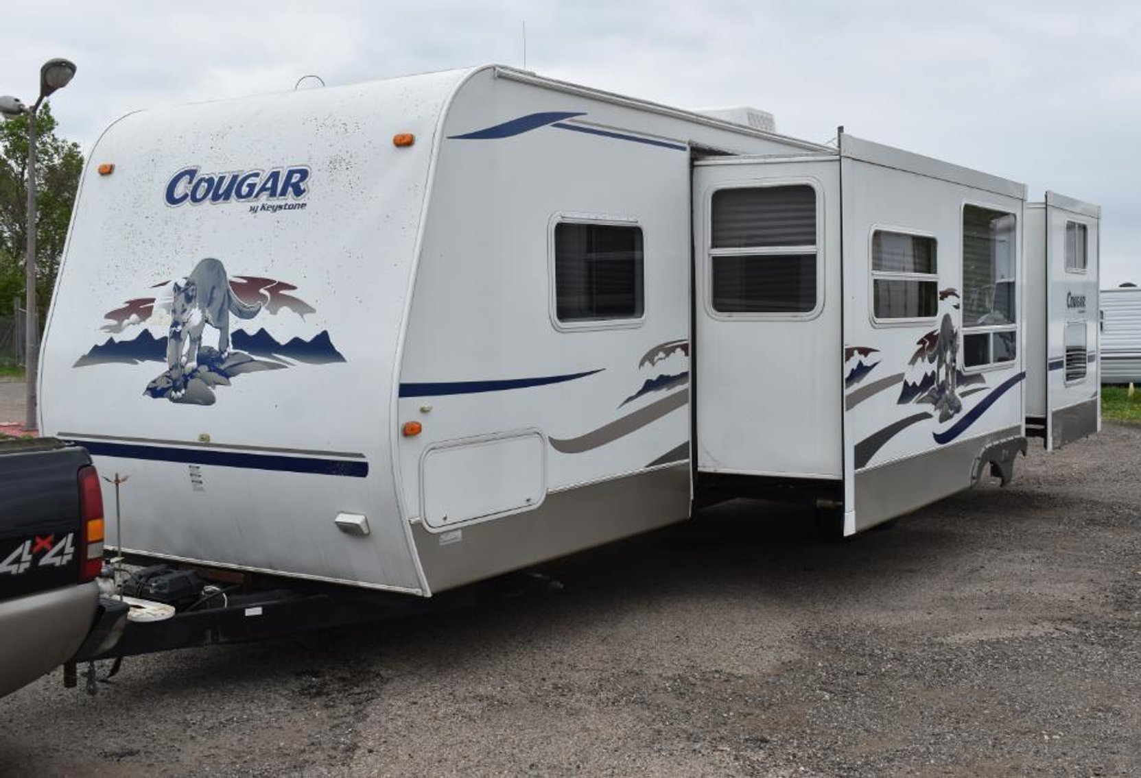 27 Units: (14) Travel Trailer, (7) 5th Wheel Trailers (1) Park Model,  (2) Vehicles