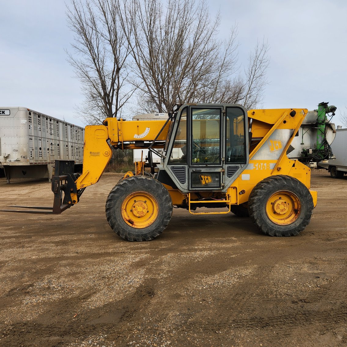 Semi Tractors, Grain & Livestock Trailers, Equipment Trailers, UVT, Snowmobiles, Lumber and More