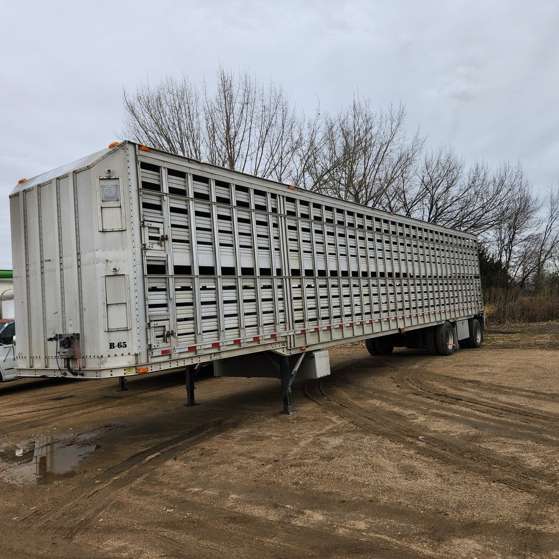 Semi Tractors, Grain & Livestock Trailers, Equipment Trailers, UVT, Snowmobiles, Lumber and More